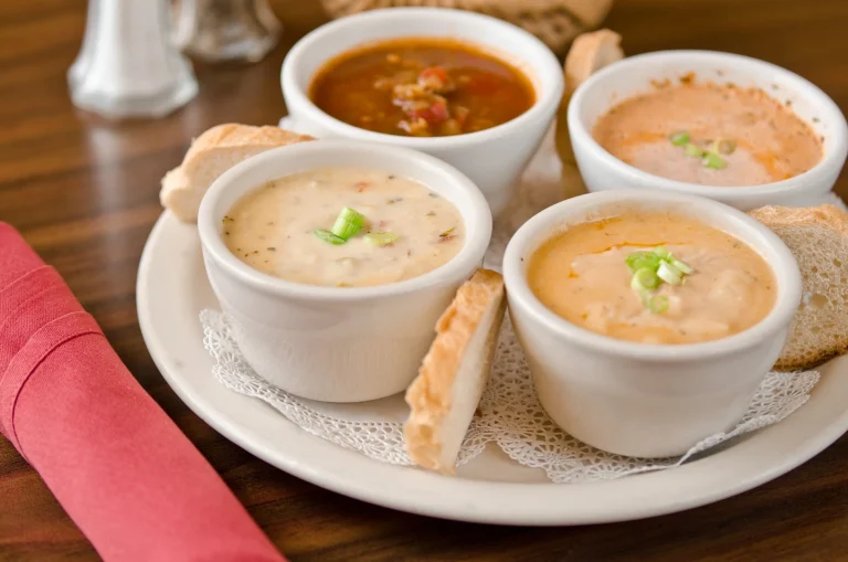 Cups of house-made soup with bread