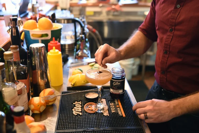 A Soup Spoon bartender mixing a cocktail